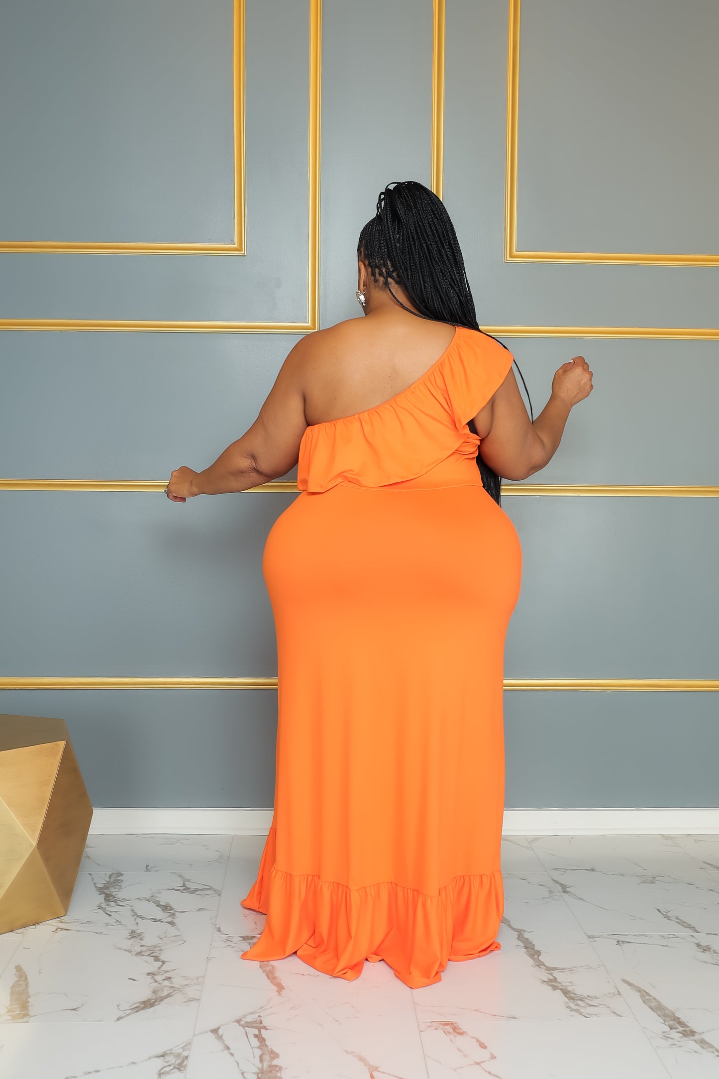 Orange In A Ruffle Dress